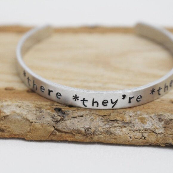 *There *They're *Their - Hand Stamped Anodized Aluminum Bangle - Adjustable - Picture 6 of 14